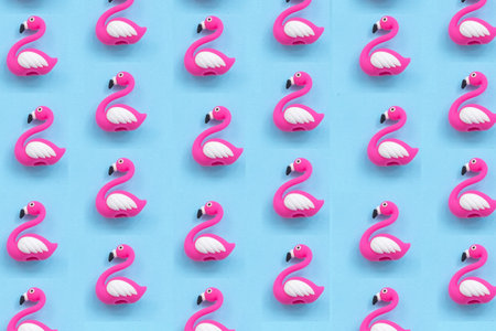 Pattern watercolor flamingo seamless pattern on dark blue background. Pink flamingo background design for fabric and decor.の写真素材