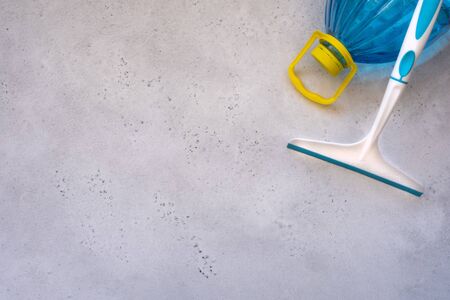 Hand cleaning a car windshield with window cleaner wiper. Wiper blades scraper silicone and hard, glass washing liquid, cleaning from snow. the concept of washing Windows, windshield wiper auto glassの写真素材