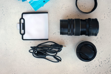 Video light, lens filters, including polarizer, gradient and adapter rings, and a box with flash...