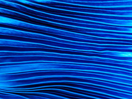 Texture, background, pattern, Cloth pleated blue. A shiny finished folded satin fabric is a light.