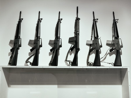 six guns standing on a shelf. home exhibition of weapons, collective storage