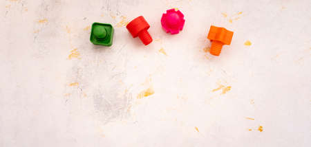 educational constructor for children, nuts and bolts in the form of geometric shapes. mock up backgroundの写真素材