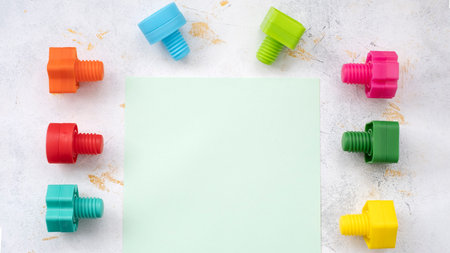 educational constructor for children, nuts and bolts in the form of geometric shapes. mock up...