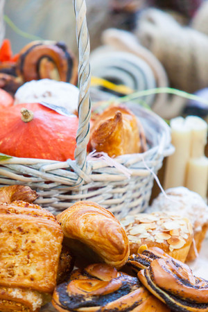 autumn picnic in the park with a basket and blanketの写真素材