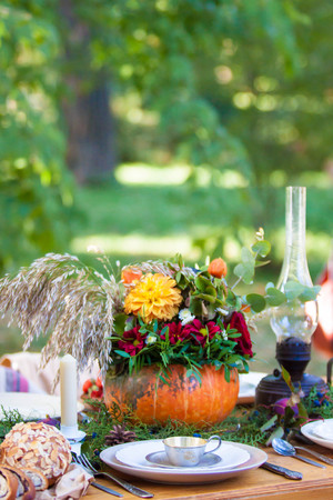 autumn pumpcin tea party in the Park table settingの写真素材