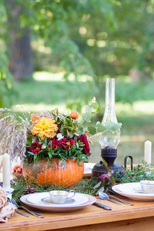 autumn pumpcin tea party in the Park table settingの写真素材