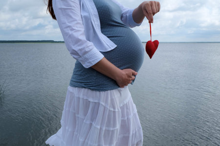 pregnant woman with heart