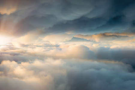 between stormy cloudsの写真素材