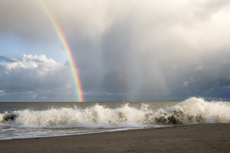 rainbow and waves of Baltic sea. Estoniaの写真素材