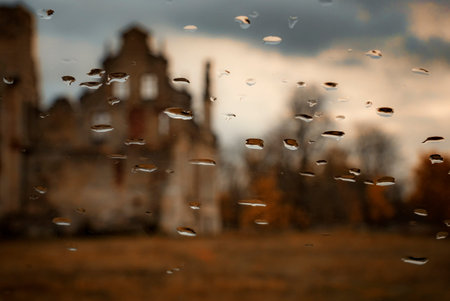 estonian autumn and castle beyond glass