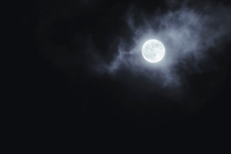 moon shining on the cloudy skyの写真素材