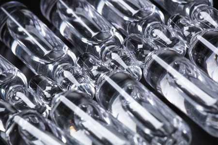 Studio photo medical ampoules on a black backgroundの写真素材