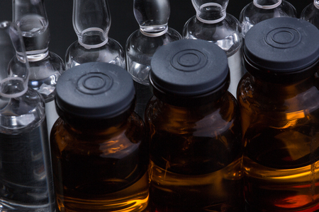 Studio photo medical ampoules on a black backgroundの写真素材