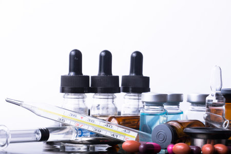 studio photo medical drugs to treat people in background
