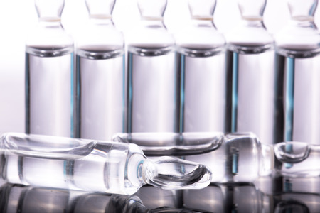 studio photo medical drugs to treat people in backgroundの写真素材