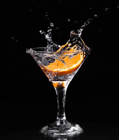Vermouth cocktail inside martini glass over dark backgroundの写真素材