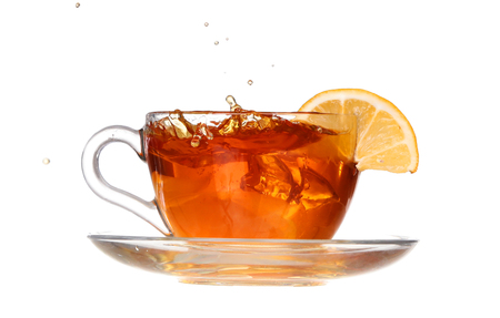 lemon tea with a splash on a white backgroundの写真素材