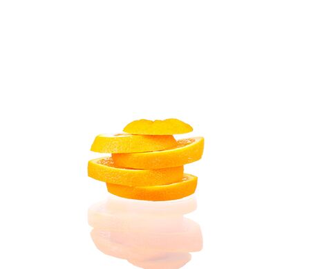 Orange fruit half and two segments or cantles isolated on white background cutoutの写真素材