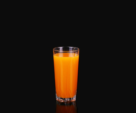 Carrots and juice in a glassの写真素材