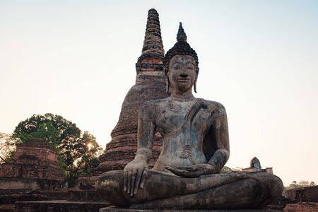 Sukhothai Historical Park,   in Thailand. Ancient Buddha Statue at Mahathat Temple.の写真素材