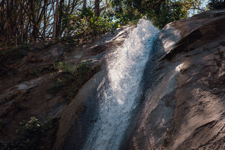 deep forest waterfall at Lan sang national park, Tak, Thailand. Tak Province Drought Seasonの写真素材