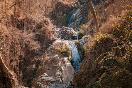deep forest waterfall at Lan sang national park, Tak, Thailand. Tak Province Drought Seasonの写真素材