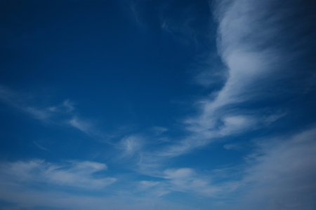 Blue sky background with clouds. sunny day near sea