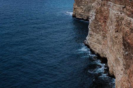 Picturesque seascape with rocky cliffs, stones, sea bay. high cliffs on the shore of the Black sea in Crimeaの写真素材