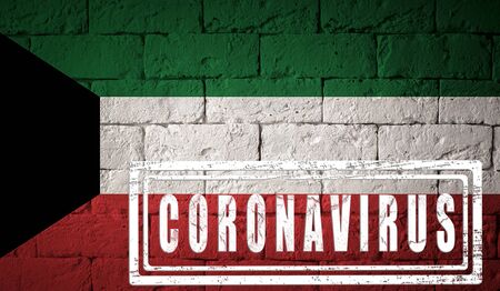 Flag of the Kuwait with original proportions. stamped of Coronavirus. brick wall texture. Corona virus concept. On the verge of a COVID-19 or 2019-nCoV Pandemic.の写真素材