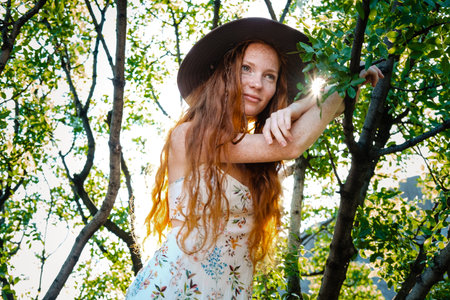 Art work of romantic woman. Pretty tenderness model looking at camera. Red-haired woman with...
