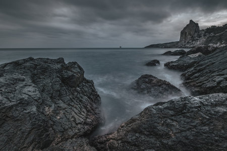 Sunset at Sea. Storm. Seascape. Waves hitting the sea shore