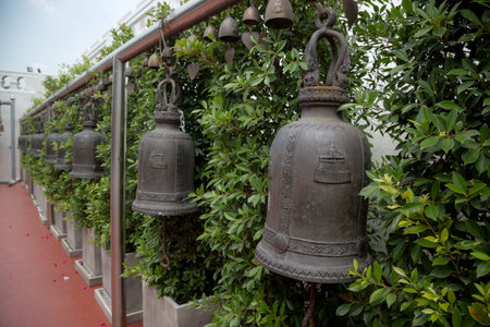 Temple bells hanged for everyone to ringed them for their own fortune at Golden Mount temple,...