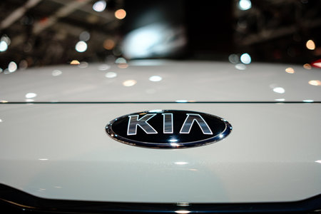 MOSCOW, SEPTEMBER 31, 2018: The newest KIA car on automotive exhibition stand on MMAC 2018. Automobile show of family personal cars. World last automotive developments and achivements. close logoのeditorial素材
