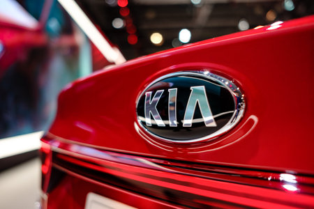 MOSCOW, SEPTEMBER 31, 2018: The newest KIA car on automotive exhibition stand on MMAC 2018. Automobile show of family personal cars. World last automotive developments and achivements. close logoのeditorial素材