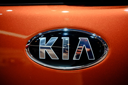 MOSCOW, SEPTEMBER 31, 2018: The newest KIA car on automotive exhibition stand on MMAC 2018. Automobile show of family personal cars. World last automotive developments and achivements. close logoのeditorial素材