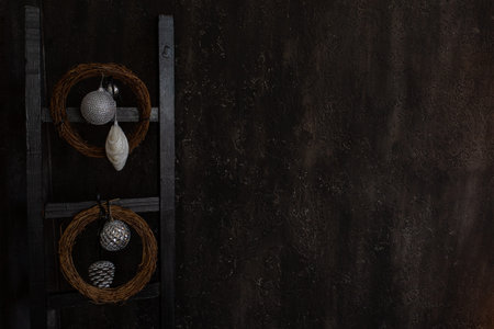 The black wall in the loft room is decorated for the New Year and Christmas. Beautiful Christmas...