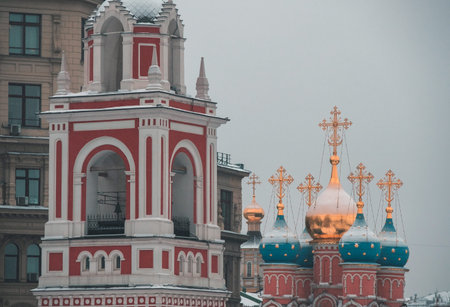 Winter in Red Square, heavy snow clouds. Christmas fair in Kremlin of Russia at evening while snow...