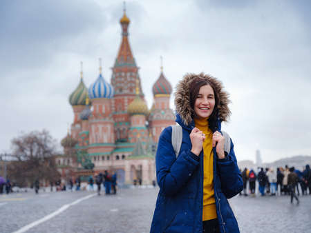 Asian tourist in travel vacations in winter Moscow. woman posing in cold Red Square in central Moscow,の写真素材