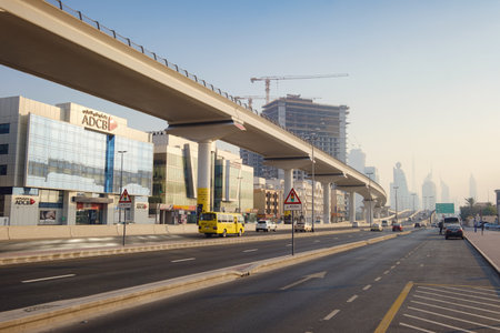 Dubai, United Arab Emirates, February 16th, 2021: Sheikh Zayd Highway in Dubai in the evening, near Zabeel parkのeditorial素材