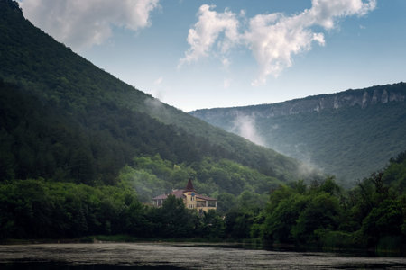 Dark and Foggy lake with hills. after the rain. Beautiful Landscape Of Natural Lake. Traveling and exploring national park.の写真素材