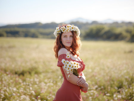 red-haired woman wearing dress and chamomile wreath on field on summer evening. concept of digital...