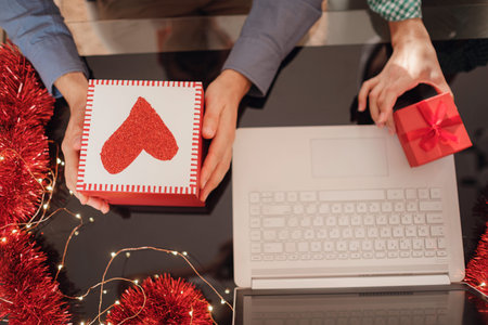white laptop pc and gift for christmas. Christmas online shopping, sales and discounts promotions during holidays, online shopping at homeの写真素材