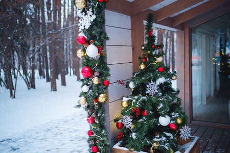 Beautiful decorated Christmas tree in a winter landscape with snow. idea and concept of winter holidays in natureの写真素材
