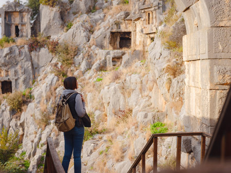 Archeological remains of the Lycian rock cut tombs in Myra, city Demre in Turkey. unique ancient...