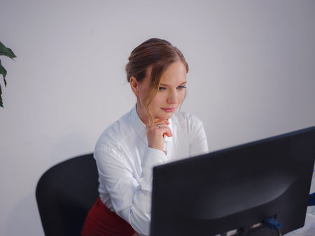Portrait of independent start up development trainer , female coach sit table desk , ready to solve...