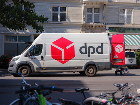 Vienna, Austria - August 11, 2022: Parked DPD Courier Delivery Van over downtown. DPDgroup is an international parcel delivery service with an extensive networkのeditorial素材