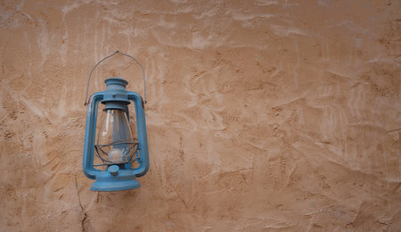 Vintage Lamp hanging outside the Al Seef Heritage Hotel, Dubai. Al seef old historical district with traditional Arabic architecture.の写真素材