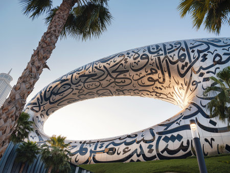 25 March 2023, Dubai, UAE: Museum of future. Sunset time View. Unique close up perspective. Cityscape skyline. Urban background. tourist trip to futuristic dubaiのeditorial素材