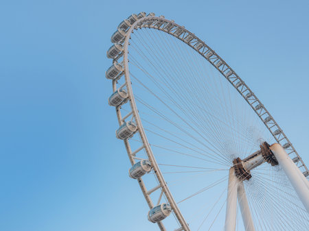 Dubai, United Arab Emirates, March 26, 2023: sunset view of tallest ferris wheel in world Ain Dubai, located in Blue waters by Meraas.のeditorial素材