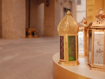 20 March 2023, Dubai, UAE: Al Seef old town village in Dubai, Ornamental Arabic lantern with burning candle glowing . Muslim holy month Ramadan Kareem. Ramadan Kareem greetingのeditorial素材